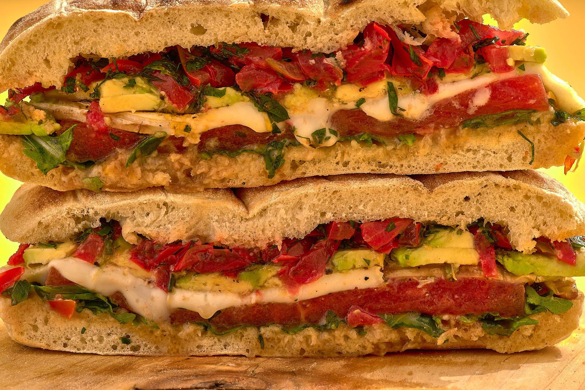 vegetarian-sandwich-with-grilled-watermelon-gremolata-garlic-paste-and-cheese vegetarian sandwich with grilled watermelon gremolata garlic paste and cheese on yellow background