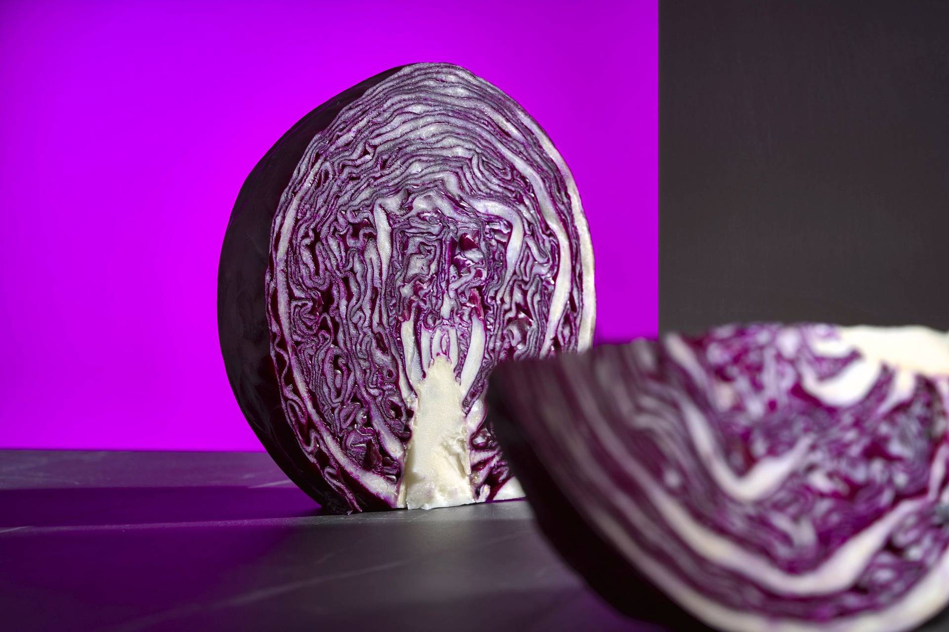 red-cabbage red cabbage on a gray marbled sapienstone top with purple background