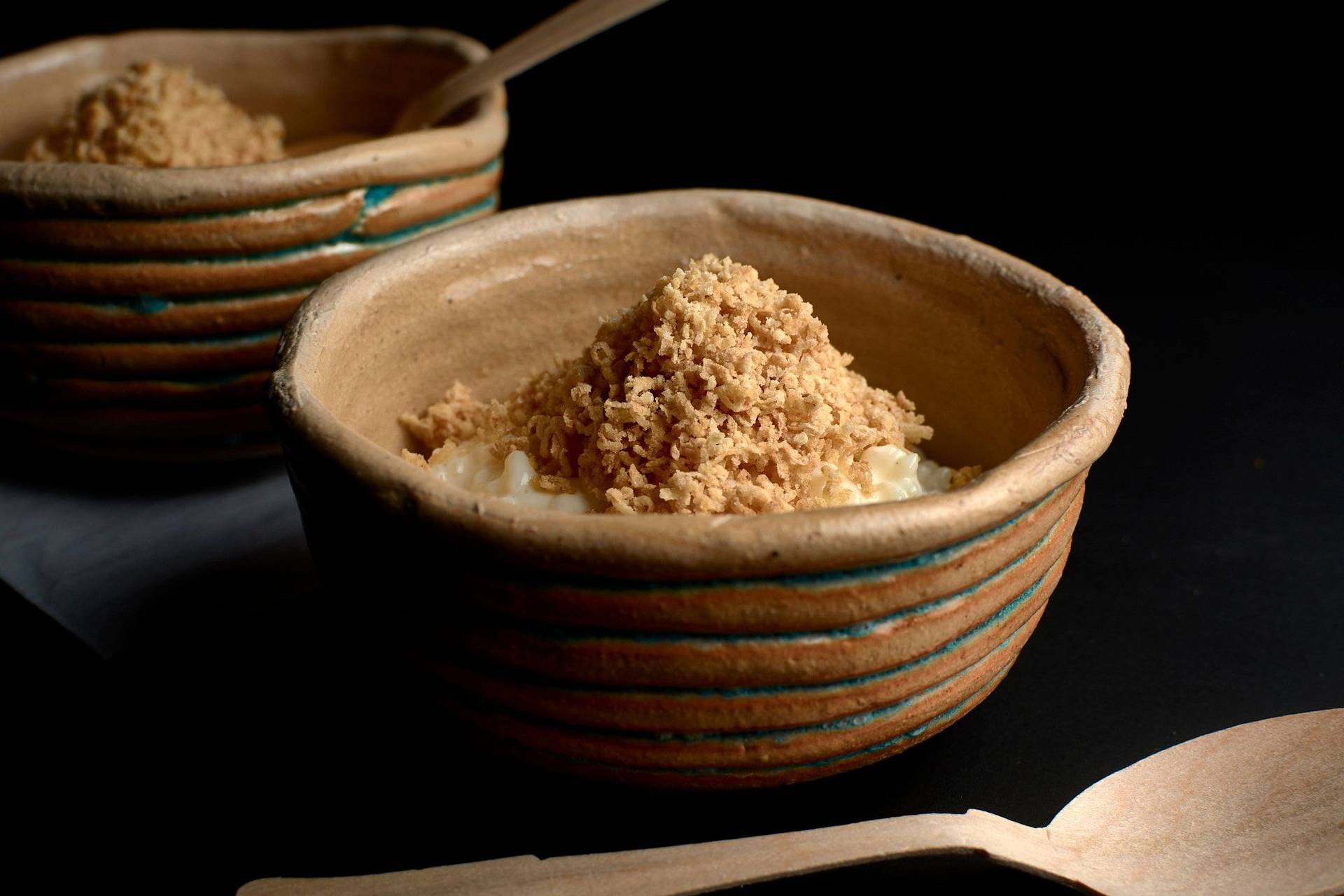 rice-pudding-with-shortbread-snow rice pudding with shortbread snow on black background