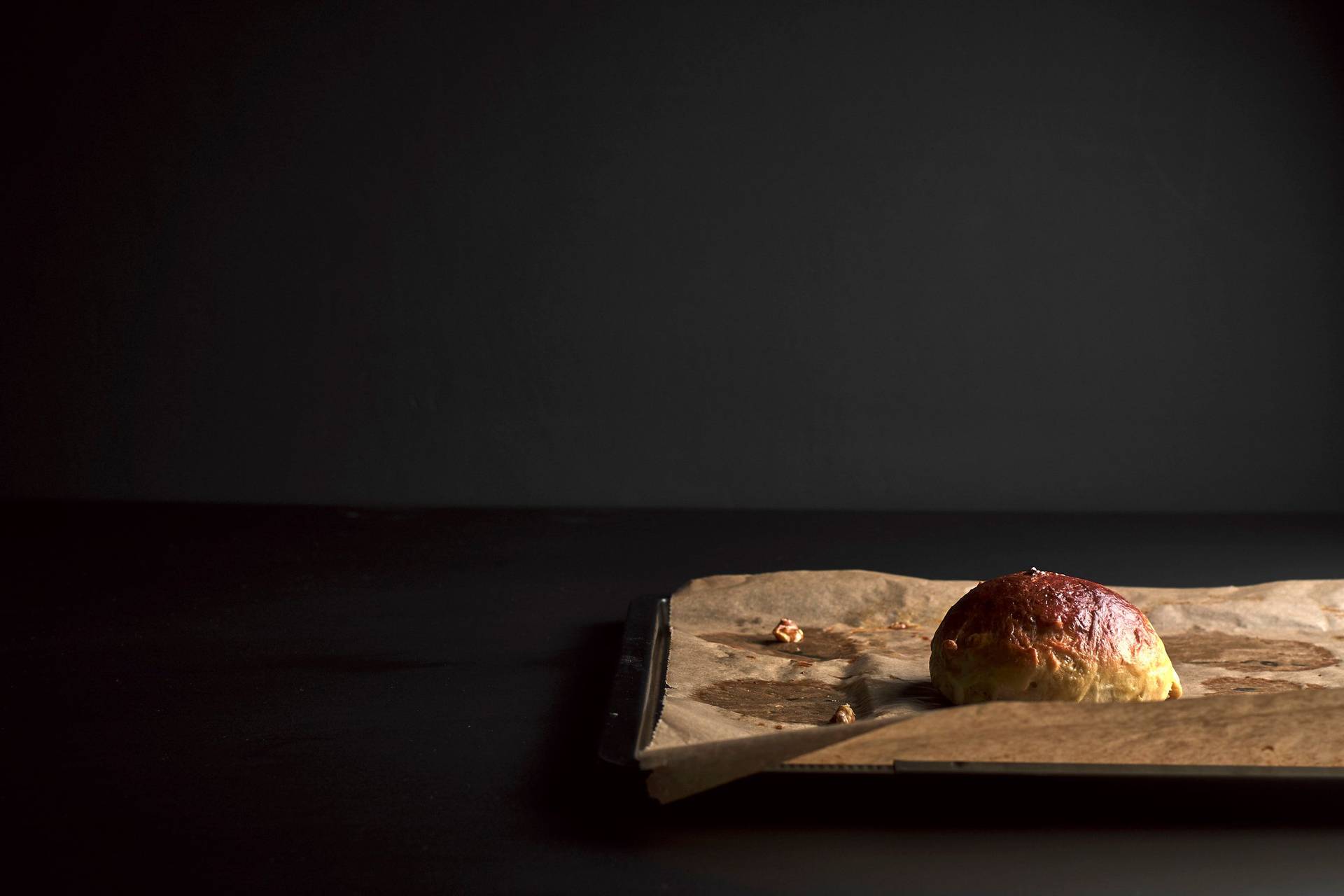 brioche-bun-with-walnuts  with black background
