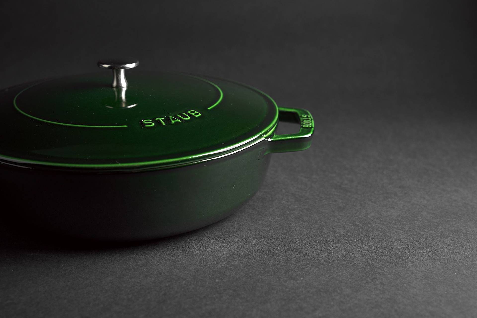 staub-la-cocotte-cast-iron-pots green staub la cocotte cast iron pot on black background