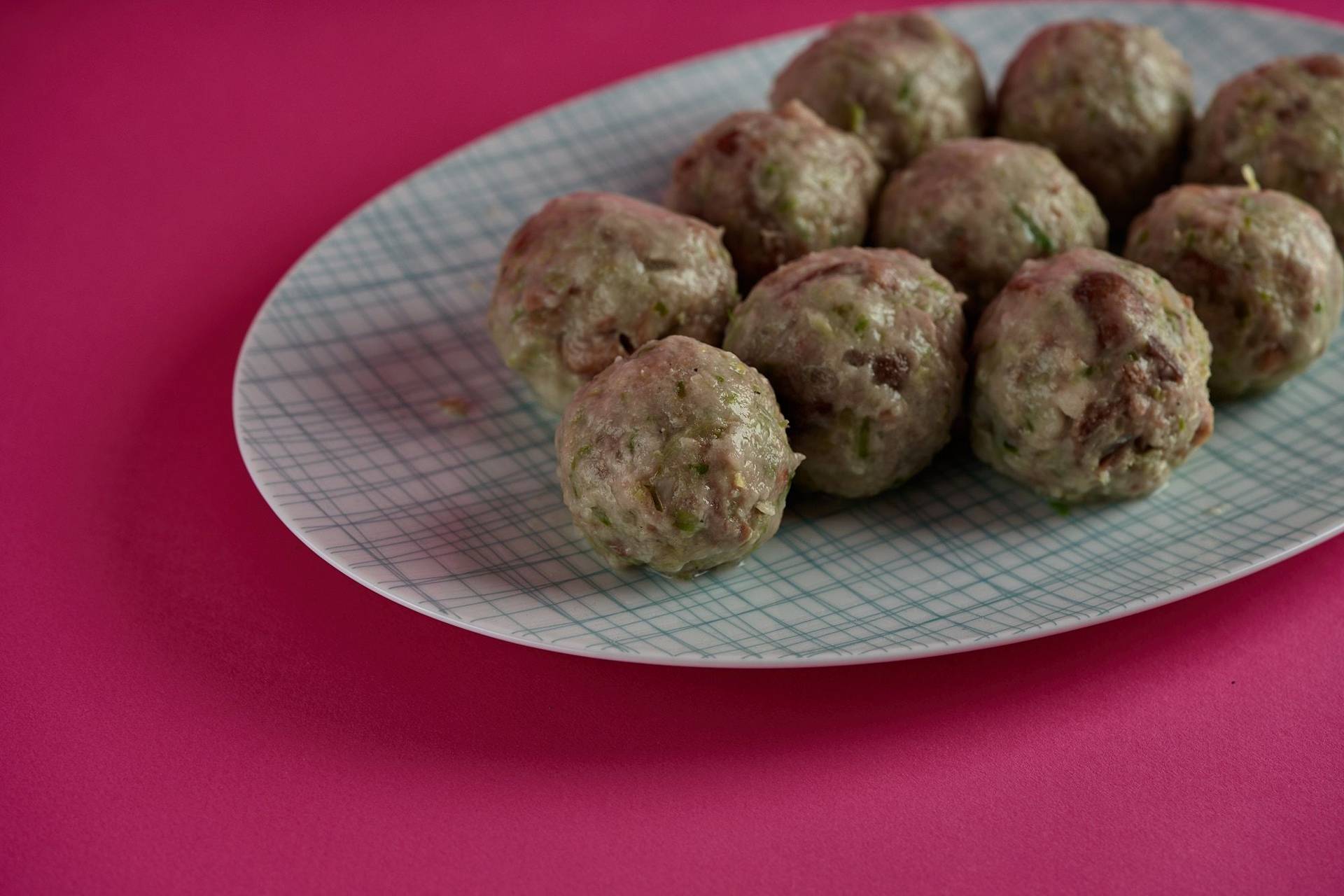 vegan-bread-dumplings-with-brussels-sprouts vegan bread dumplings with brussels sprouts on pink background