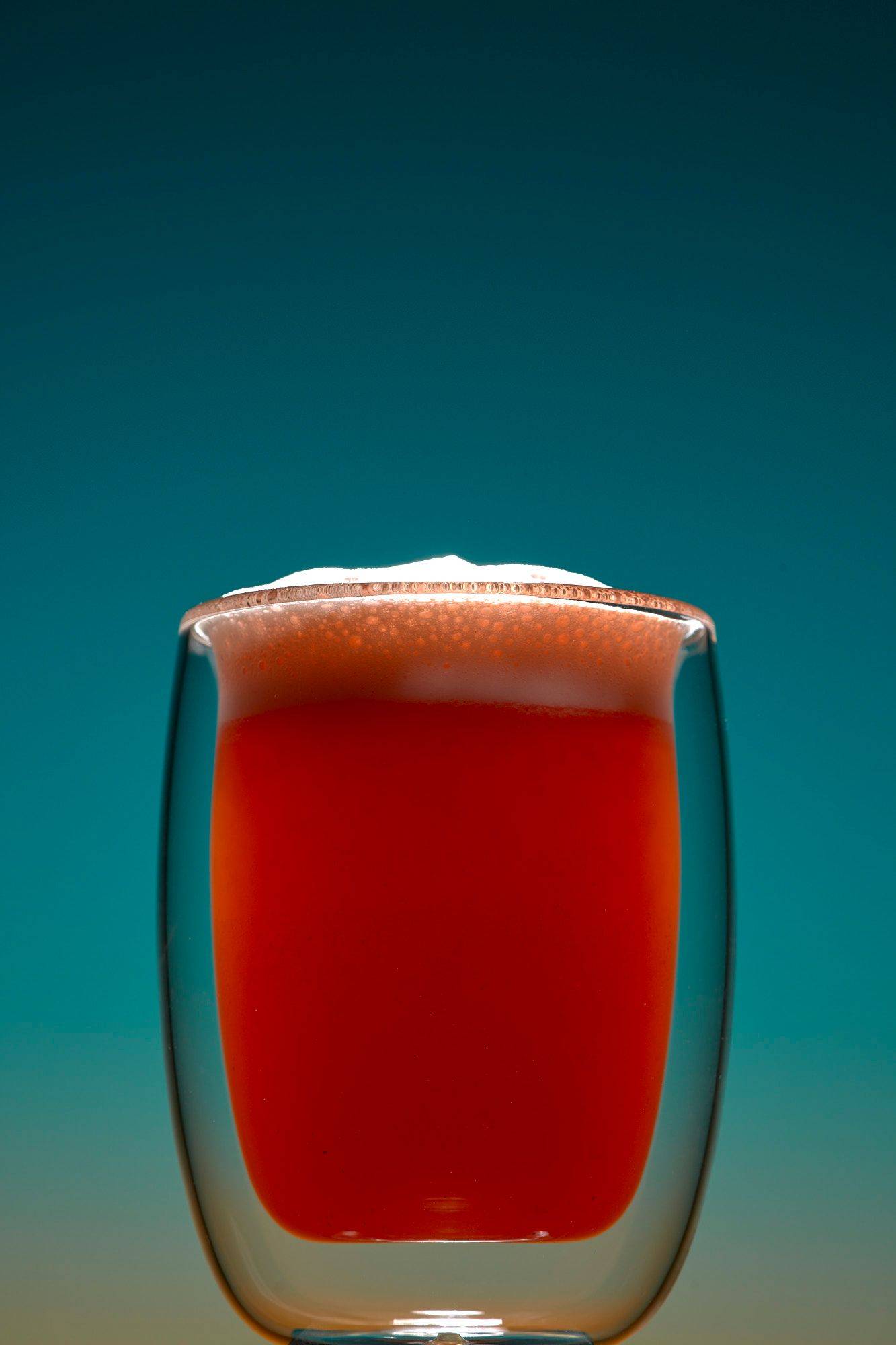 non-alcoholic-grapefruit-fizz-mocktail non-alcoholic grapefruit fizz mocktail on blue background