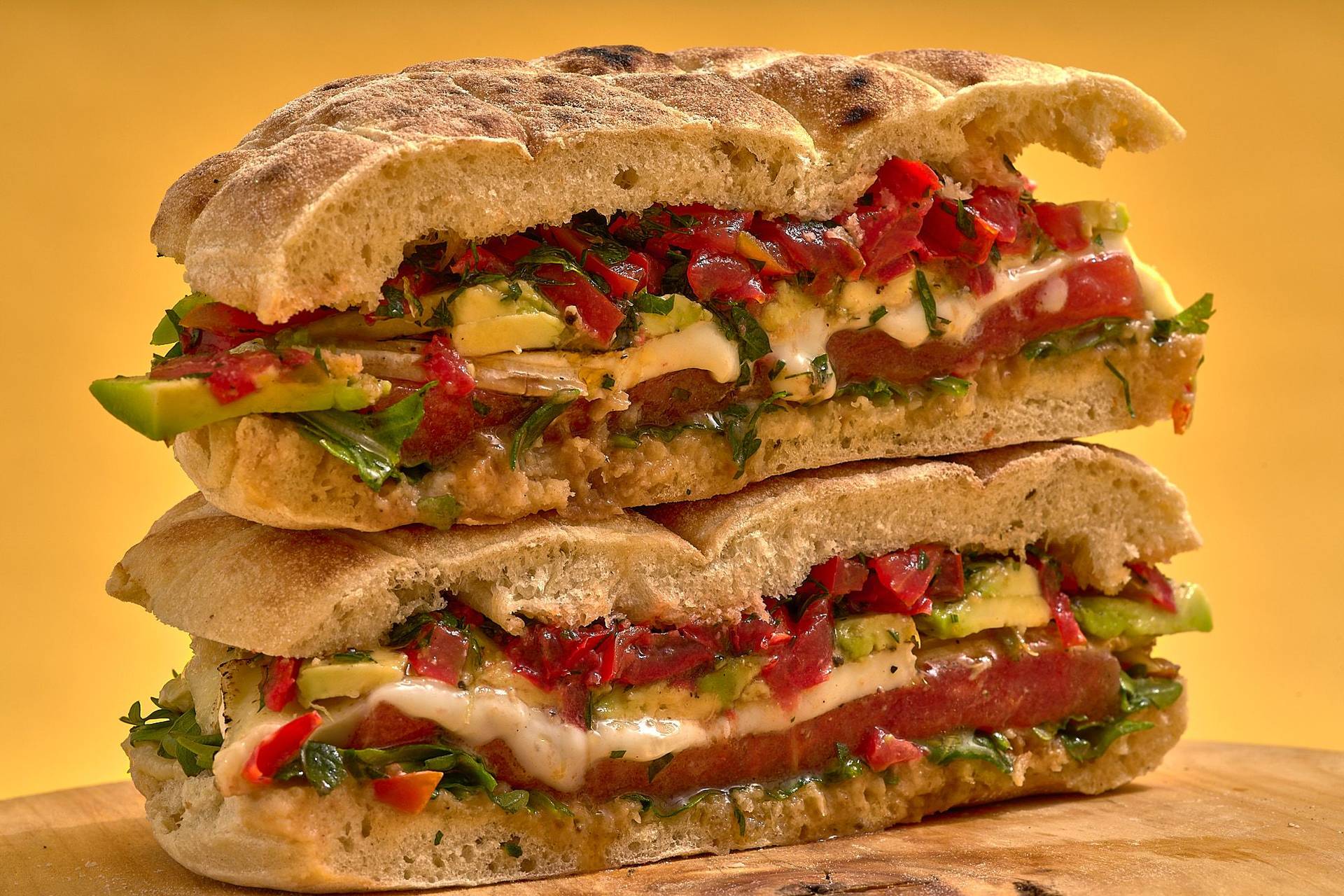 vegetarian-sandwich-with-grilled-watermelon-gremolata-garlic-paste-and-cheese vegetarian sandwich with grilled watermelon gremolata garlic paste and cheese on yellow background