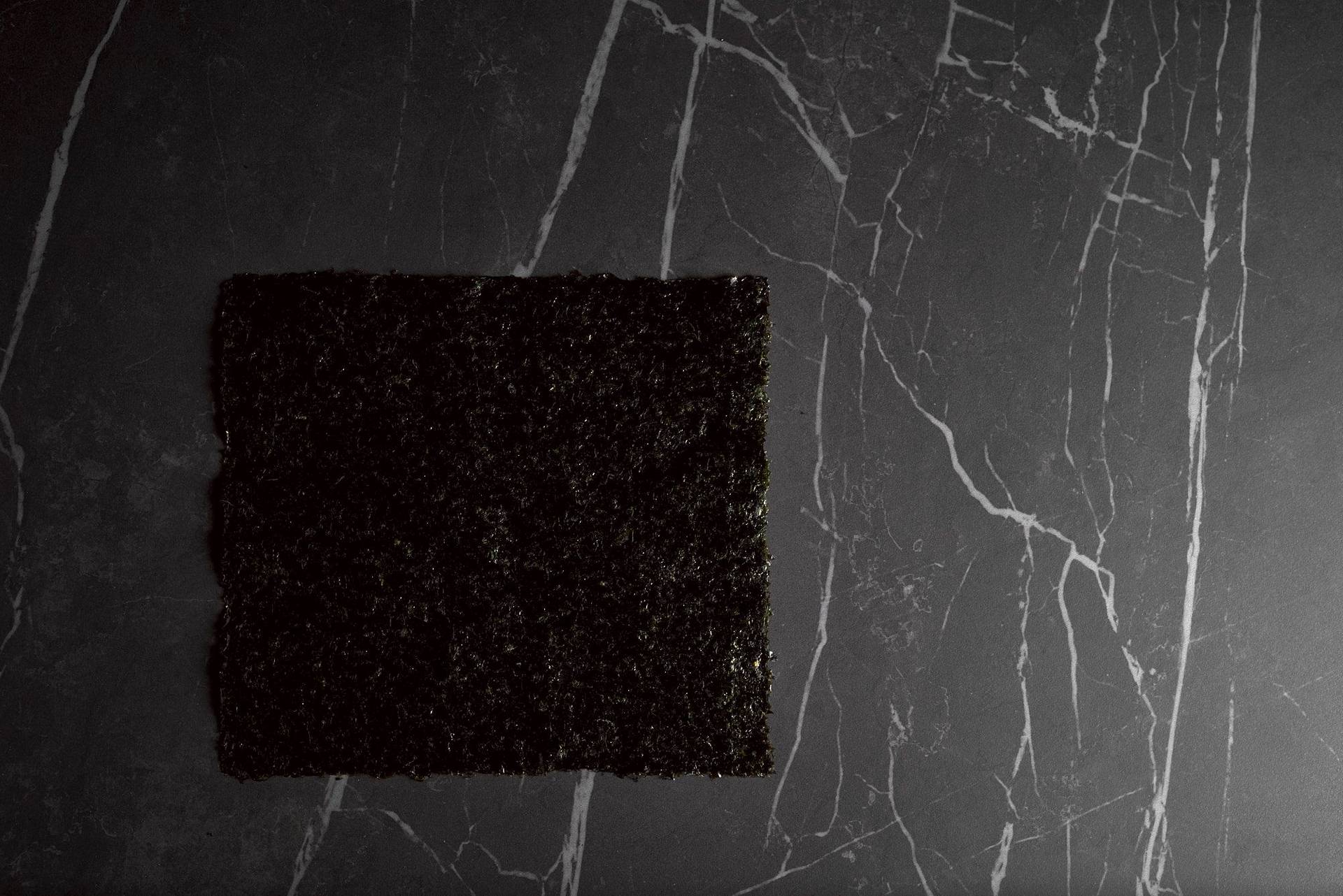 nori a nori leaf on a gray sapienstone top