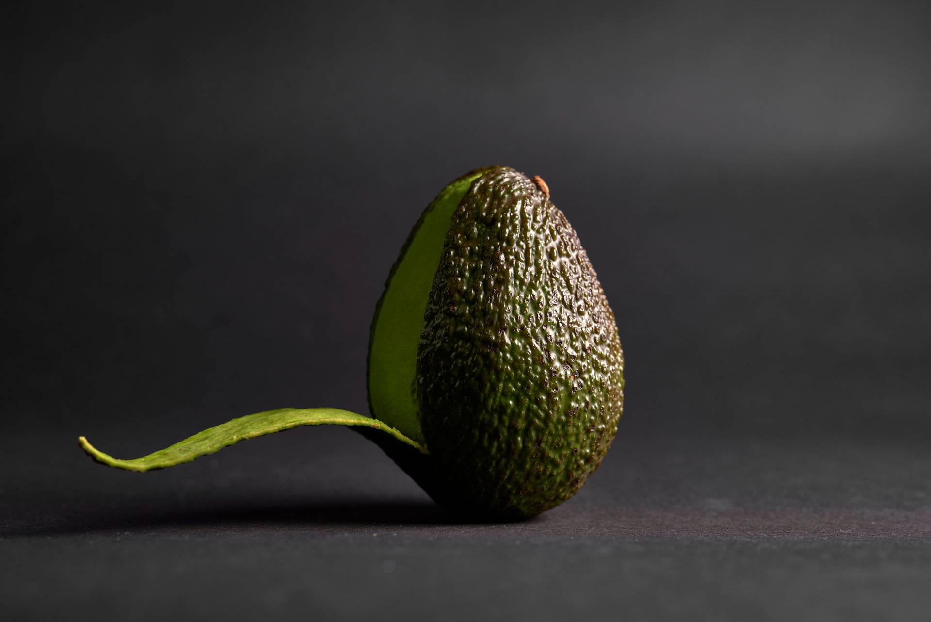 avocado avocado with black background