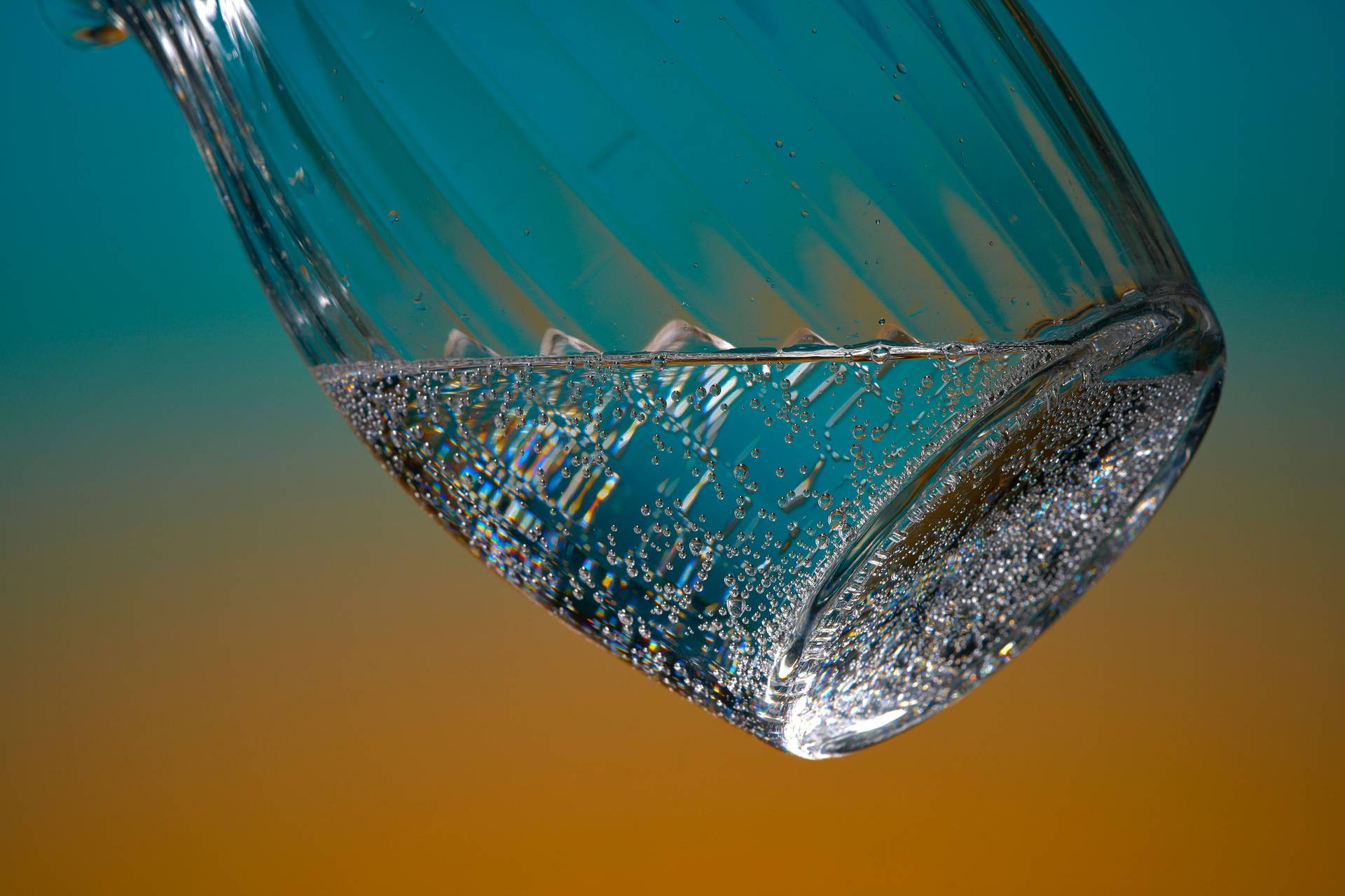 soda-water a jug of soda water on blue and orange background