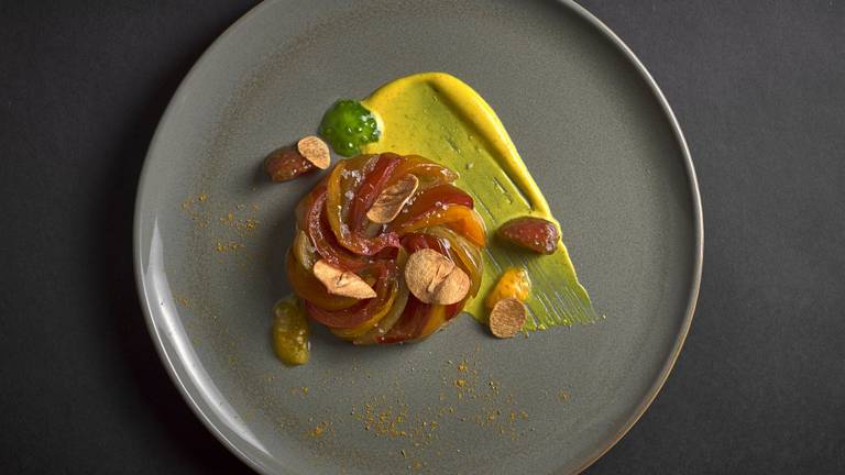 Tomato Tarte Tatin with Curry Crème Fraîche & Garlic Crisps